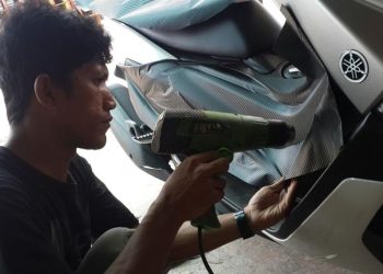 Tips Melepas Stiker agar Cat Tidak Rusak